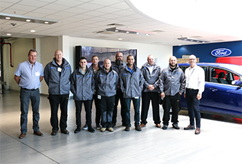 A group of Autotech Recruit Fly-In Ford Technicians at Henry Ford Academy in Daventry