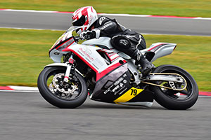 Gavin White racing on his bike with Autotech Recruit sticker on it