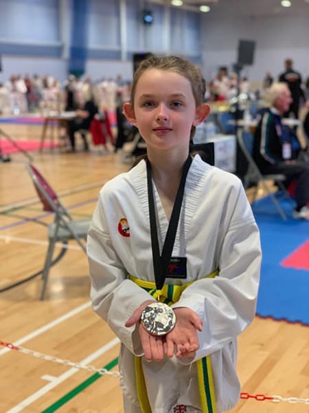 Autotech Recruit Sponsors Taekwondo Champion Katy (2) Katy showing off her gold medal