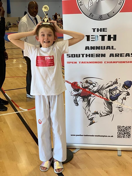 Autotech Recruit Sponsors Taekwondo Champion Katy (3) Katy showing her trophy