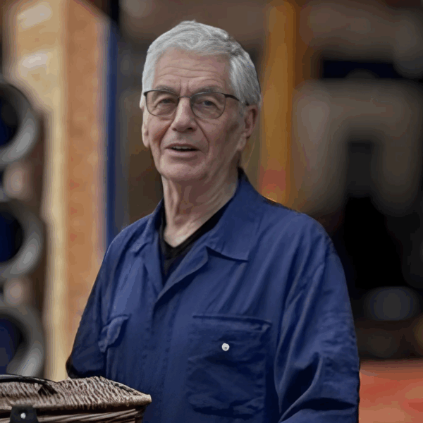 Geoff, aged 80, pictured in front of the garage where he is currently on contract MOT testing placement through Autotech Recruit.