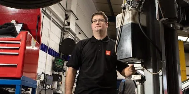 Autotech Technician working on vehicle